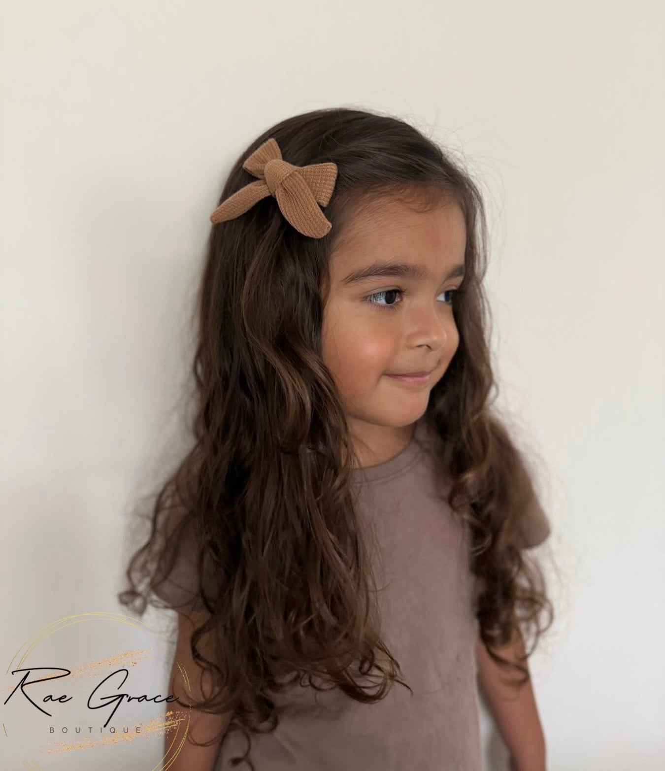 Brown knit hand tied bow