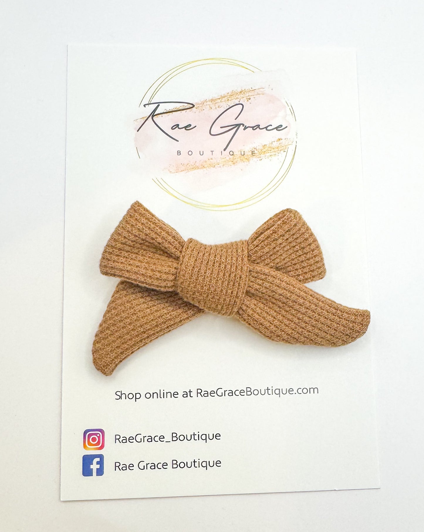 Brown knit hand tied bow