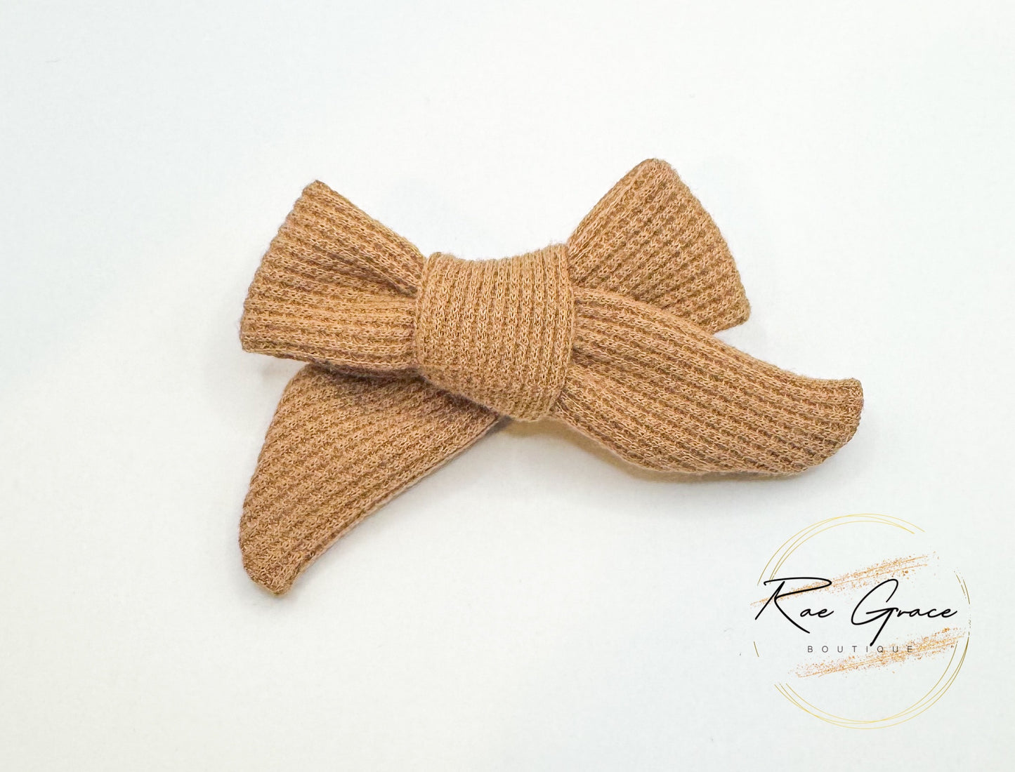 Brown knit hand tied bow